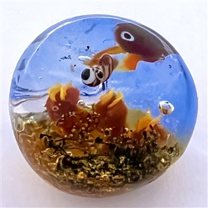 Mary Gaumond’s mother bird feeding it’s young glass studio button.