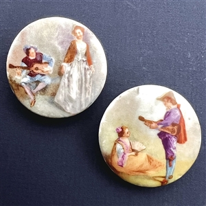 Two large ceramic buttons of women with musicians.