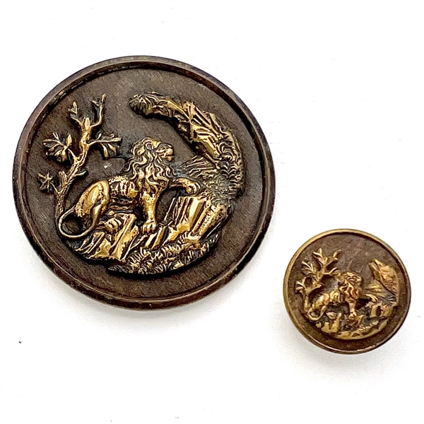 Two fable buttons of “Lion in a Lush Valley”.