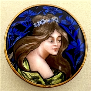 Enamel button of a beautiful Pre-Raphaelite (?) woman.