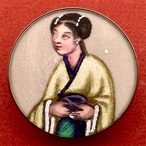 Painting on fabric button of an Asian woman.