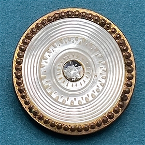 An 18th c. Pearl button with thick thread back.