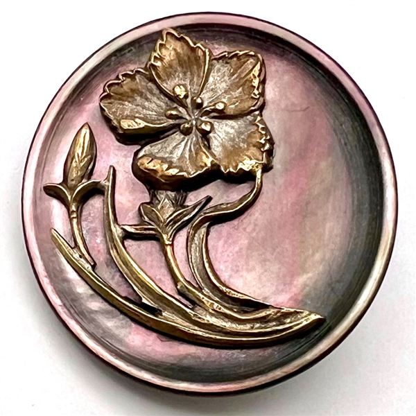 Art Nouveau era brass flower over shell button. 