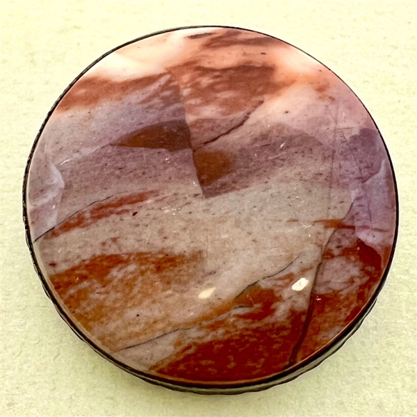 Large agate button set in silver.