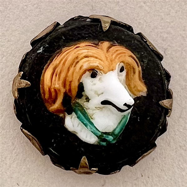 Adorable painted glass dog head over leather set in brass button. 