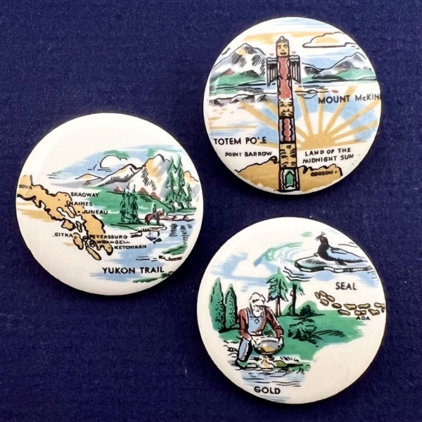 Set of three porcelain studio buttons of scenes from Alaska by Edith Morlock