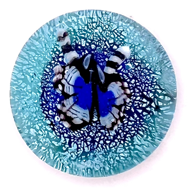 Glass paperweight studio button of a butterfly by Mary Gaumond.