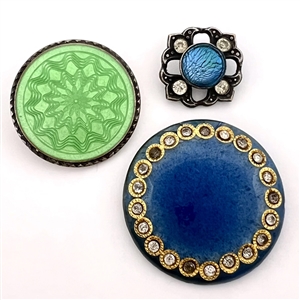 Three interesting enamel buttons. 