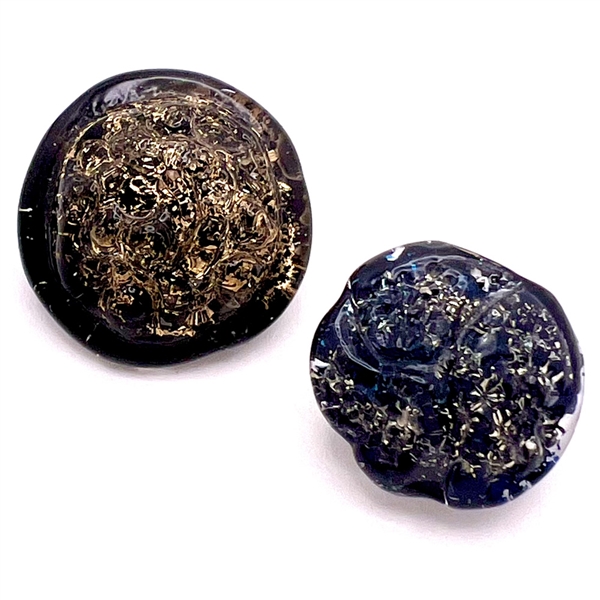 Two reverse painted French Couture glass buttons by André Molco.