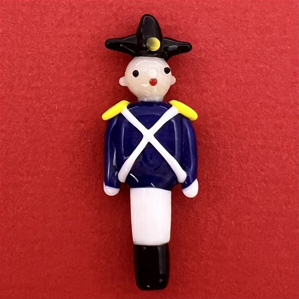 Glass realistic toy soldier button.