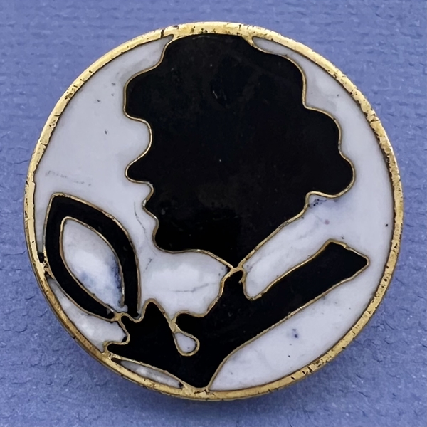 Modern enamel button with two sides.