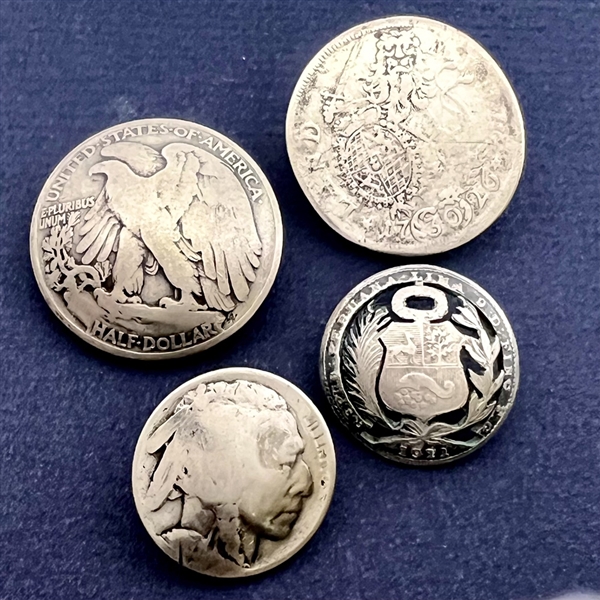 Four coin buttons (made from actual coins.)