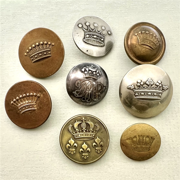 Eight Livery & uniform crown buttons.