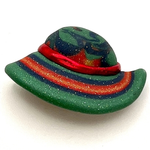 Sculpty clay studio button of a hat by Maria Kragh.