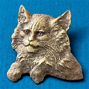 Realistic brass cat button. 