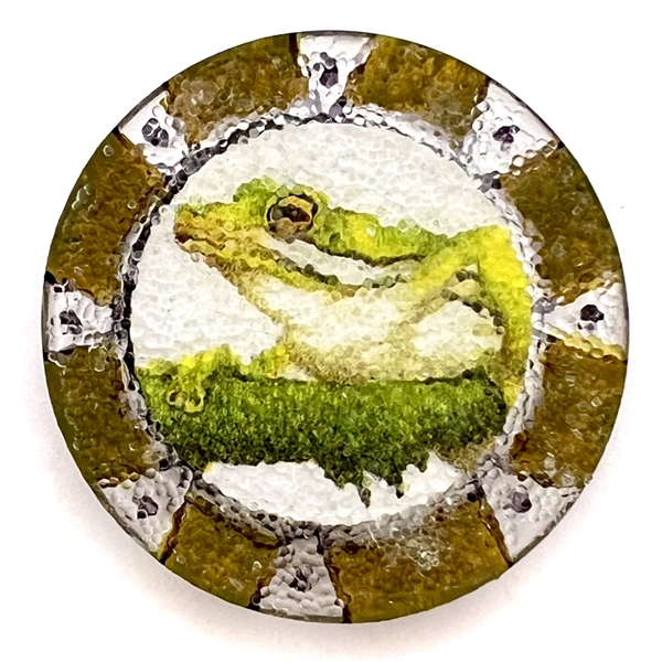 Studio button of a frog.