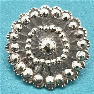 An 18th c. Steel button, scalloped with cut-steel trim.