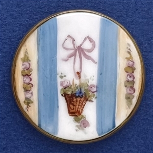 A 19th c. Painted porcelain button of bow  and basket of flowers.