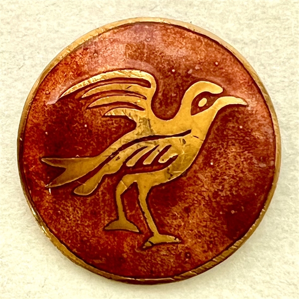 French couture enamel button of a bird by Cole. 