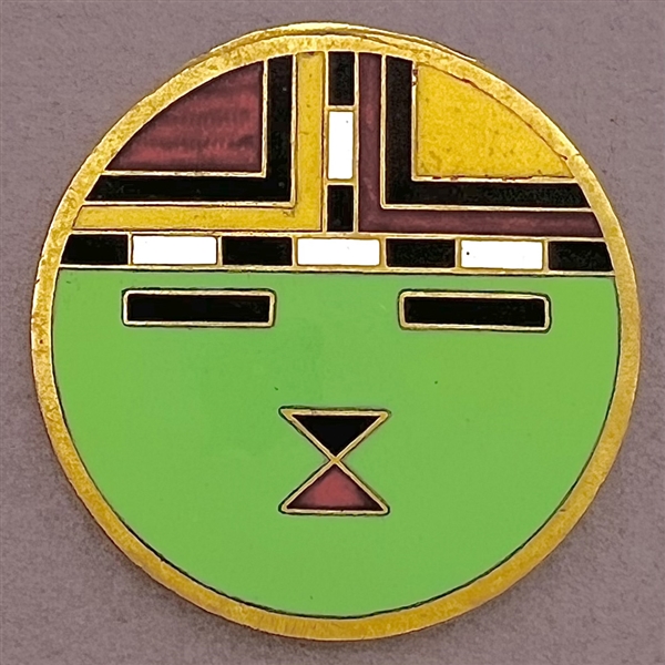 A 20th c. enamel button of native American design.