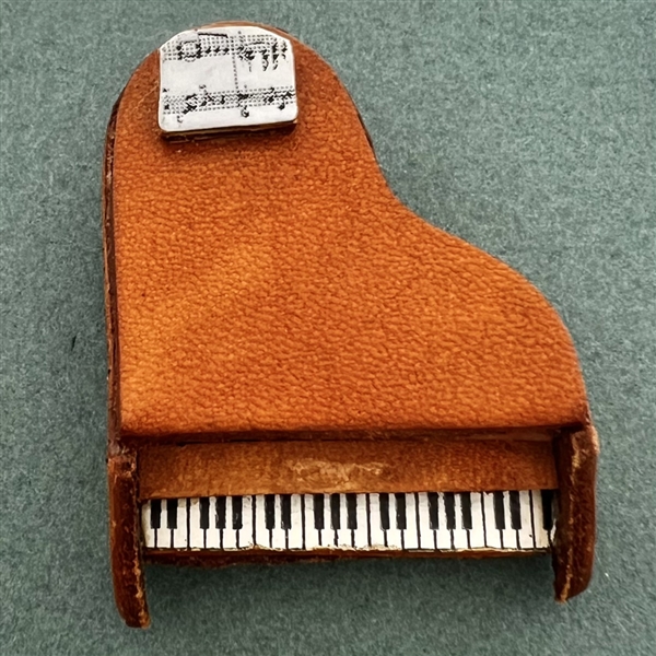 Leather button of a piano.