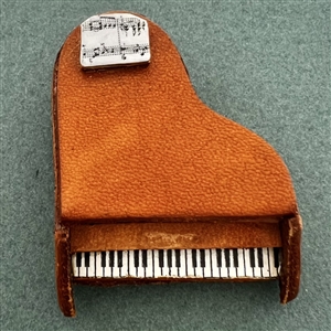 Leather button of a piano.