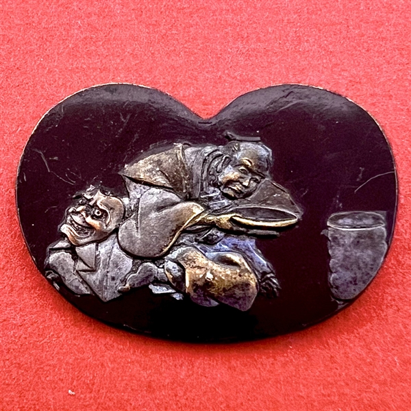 Japanese Shakudo button of robed figure.