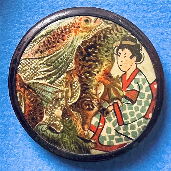 “Japanisme" transfer with paint and gold details under celluloid button of Japanese woman with carp “streamers."