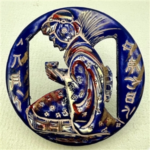 Huge Vintage cobalt blue tinted celluloid button of an Asian woman.