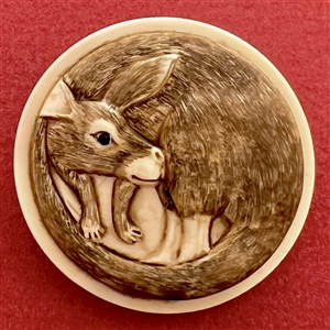 Natural material button of an Australian kangaroo.