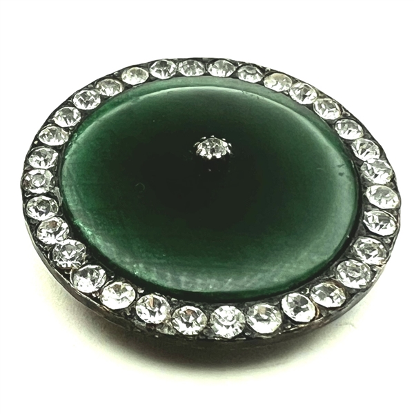 A 19th c. Green glass in silver button with pastes.