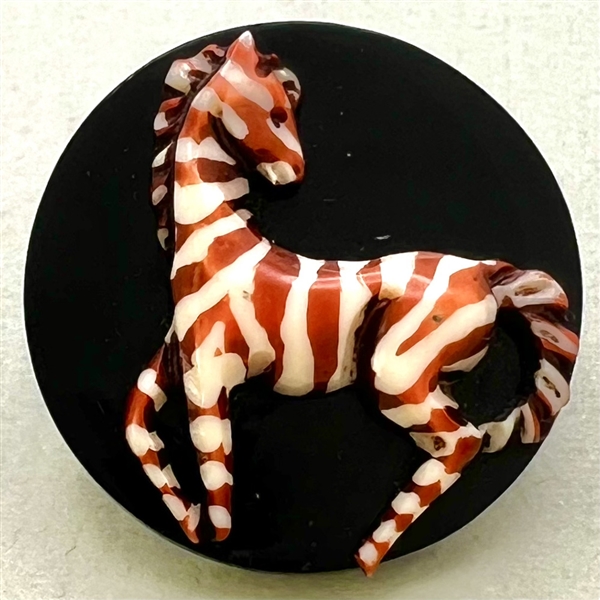 Large Vintage celluloid zebra on phenolic resin.