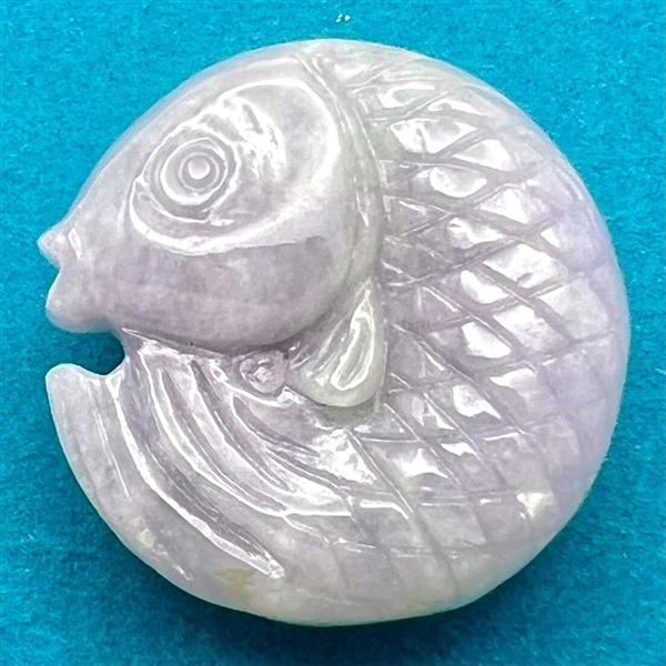 Realistic jade koi fish button. 