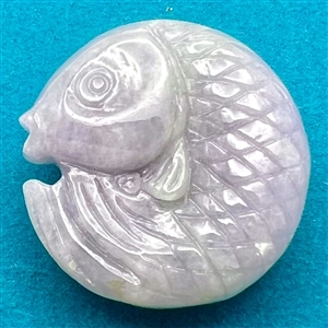 Realistic jade koi fish button. 