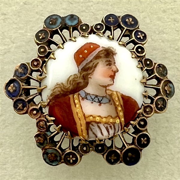 A 19th c. Porcelain button of a woman.