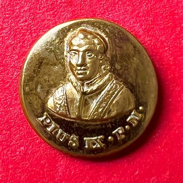 A 19th c. Gilded brass commemorative button of Pope Pius IX. 