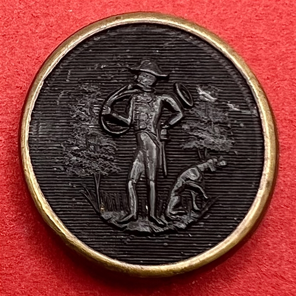 Rare rimmed molded horn sporting button of hunter with hound.