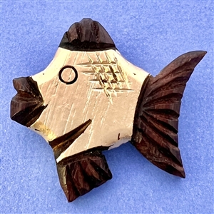 Vintage carved wood button of a fish.