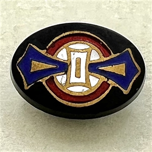 Composition button with enamel design.