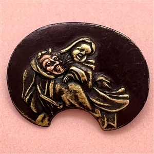 Japanese Shakudo button of robed performer holding a mask.