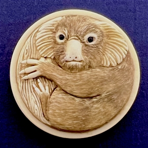 Carved natural material button of an Australian Koala bear. 