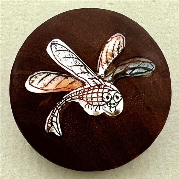 Shell inlay in boxwood of a dragonfly.