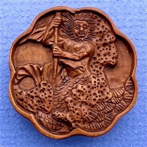 Boxwood button of a merman in the sea.