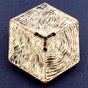 Unique four hole Burwood “imitation cube”  button .