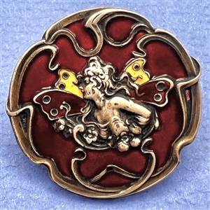 Unusual Art Nouveau enamel button of a fairy.