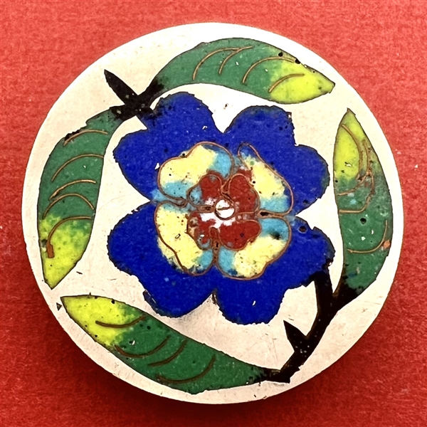 Very early Chinese enamel cloisonné button of a flower and leaves.