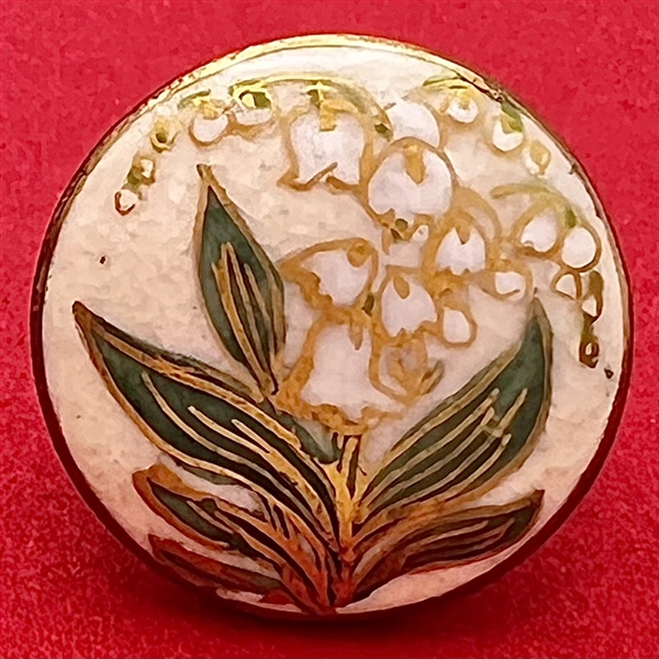 Satsuma button of Lily of the Valley flowers.