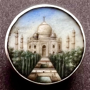 Painting on natural button of the Taj Mahal.