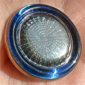 Mercury glass design under glass button from 1920’s.