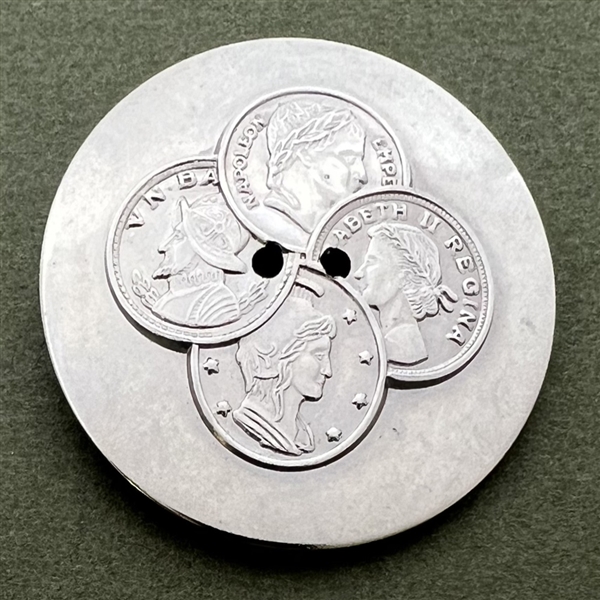 Coin-type white metal button.